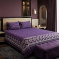 Royal Purple Medallion Bedsheet Set with deep purple trellis pattern and ornate white mandala medallion border styled on a luxury bed
