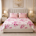 Pink Sakura Bloom Bedsheet Set with scattered watercolour hot pink magenta cherry blossom branches on crisp white background with blush pink damask pillow covers styled in a luxury bedroom