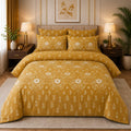 Mustard Mughal Daisy 7 Piece Comforter Set with repeating Mughal botanical white daisy blooms and ivory scrolling vine motifs on rich mustard golden-yellow background styled in a warm amber-gold luxury bedroom