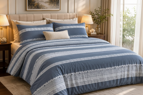 Azure Stripe Bedsheet Set styled on a luxury bed in an elegant bedroom
